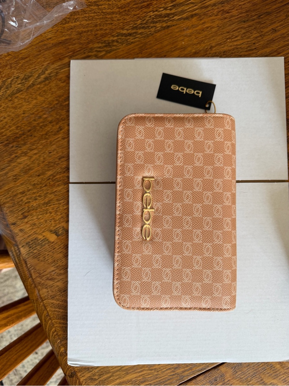 bebe Monogram crossbody in Rose Gold